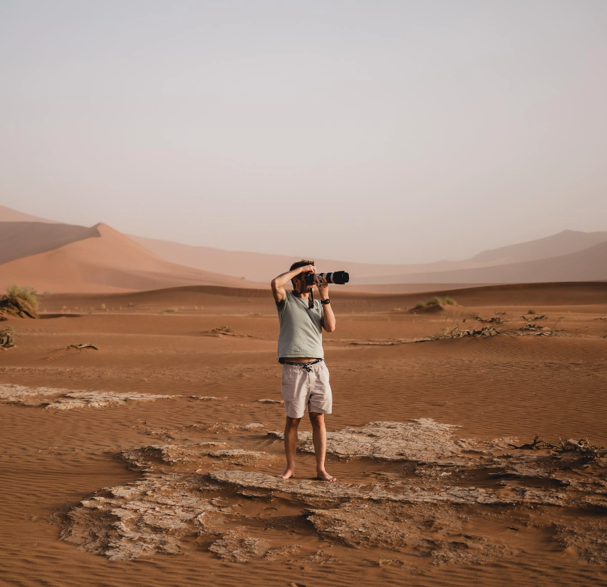 SP van der Merwe photographing the red dunes of the Namib desert